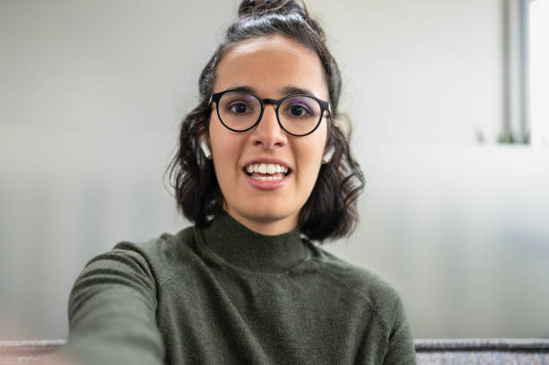 istock Female Influencer Vlogging Online With Smartphone From Home 1445790165