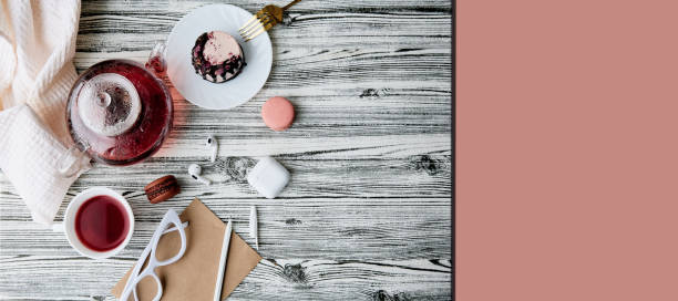 Aesthetics pink healthy gluten free and sugar free raspberry dessert with organic tea flat lay. Healthy vegan food. Feminine lifestyle background. Extra wide banner