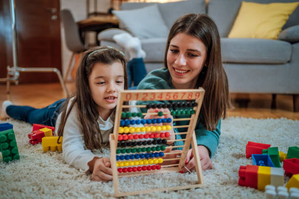 istock Girl learning to count at home 1445792618