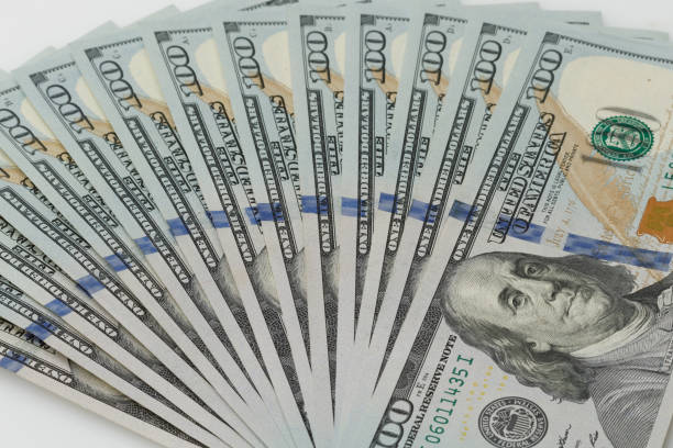 istock Fan of one hundred dollar American bills. 1445796636