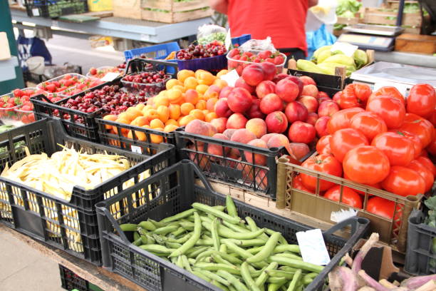 a market stall with vegetables
