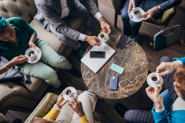 istock Business people sitting in cafe 1445798660