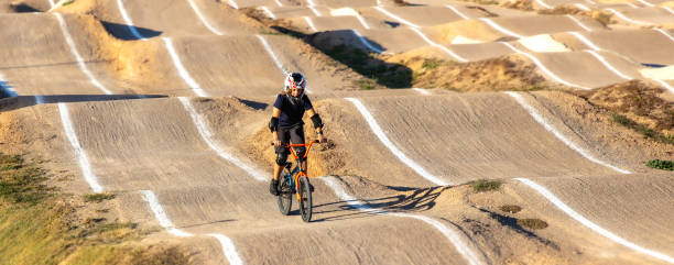 istock young boy riding with bmx 1445798947