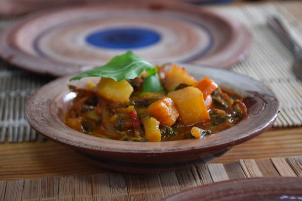 istock Aegean herb dish with vegetables from aegean cuisine on a wooden table 1445801521