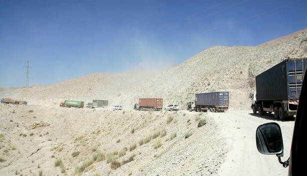 Trucks on the road between Jalalabad and Kabul in Afghanistan stock photo