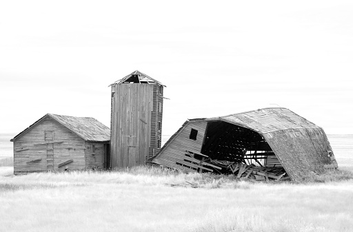 An abandoned farm on the prairie.
