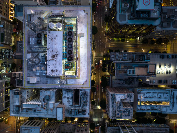 istock Drone Shot Looking Straight Down on Rooftops in Downtown LA at Dusk 1445816985
