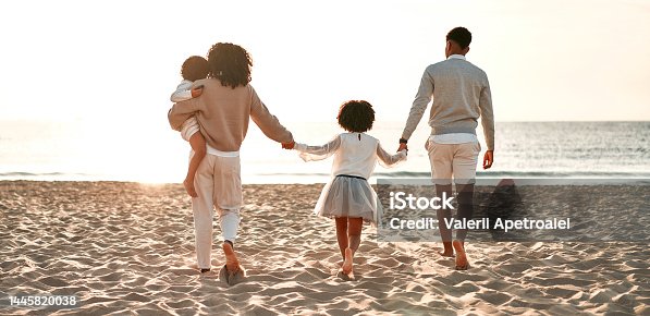 istock African American family on the beach on the weekend 1445820038