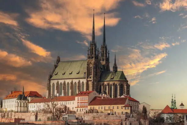 Photo of View of the city of Brno in the Czech Republic in Europe from the pilberk viewpoint. The dominant feature of Brno is the Cathedral of St. Peter - Petrov. There is a nice dramatic sky in the background.