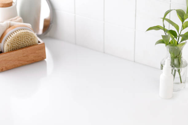 istock Background for product presentation for cosmetic, mock up. Tile, white cosmetic table with mirror
and accessories. Bathroom view. 1445824487