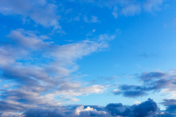 istock Beautiful cumulus clouds in the light blue sky 1445826357