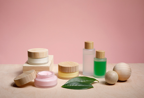 Different  organic beauty products  with wooden decoration