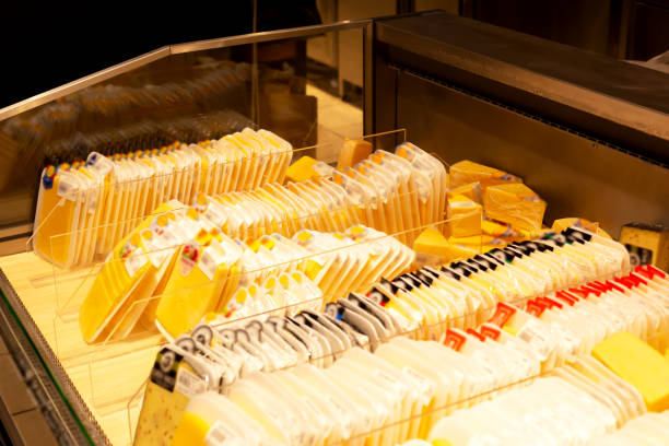 istock Showcase with cheeses in the supermarket 1445826858