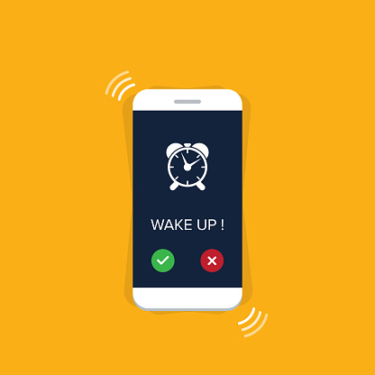 Phone with app alarm clock on the screen