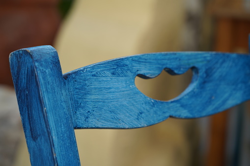Blue top rail of traditional greek chair