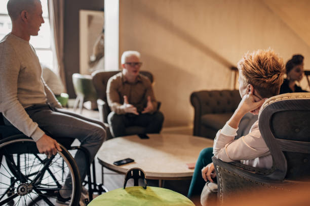 istock Business people in hotel lobby 1445834616