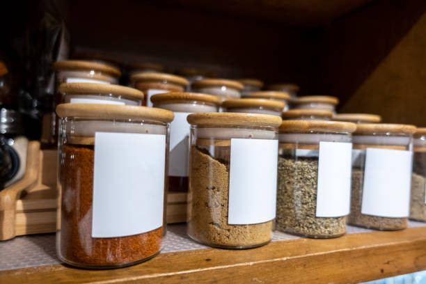 istock Selective focus on blank labeled seasoning jars inside a cupboard in a home kitchen 1445835941
