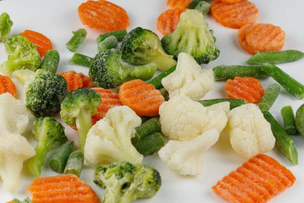 istock Frozen vegetables close-up on a white background. 1445836222