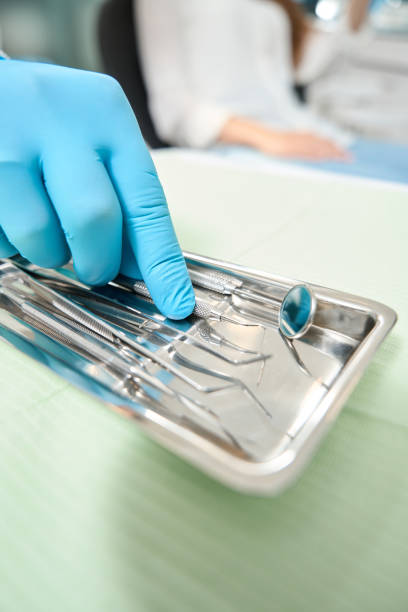 istock Doctor is choosing tools for patient examination 1445836599