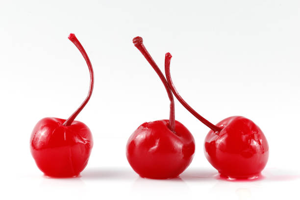 istock Cocktail cherry with stalk on black. red cocktail cherry 1445836694