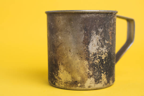 istock Dirty metal mug for camping 1445841342