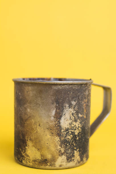 istock Dirty metal mug for camping 1445841470