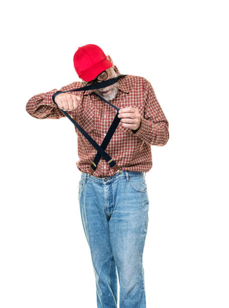 istock Senior Adult Man Hillbilly Pulling His Suspenders 1445843996