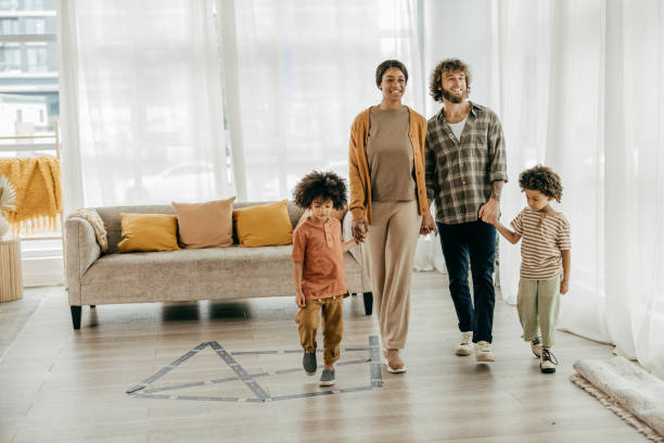 istock Family visiting new home with kids 1445844609