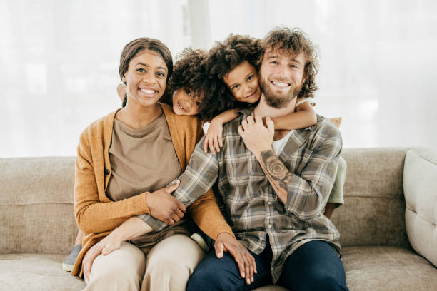 istock Happy kids with smiling parents at home 1445844629