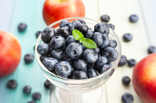 blueberry bowl on wood background