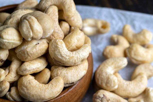 istock Fresh peeled cashew nuts on the table 1445846969