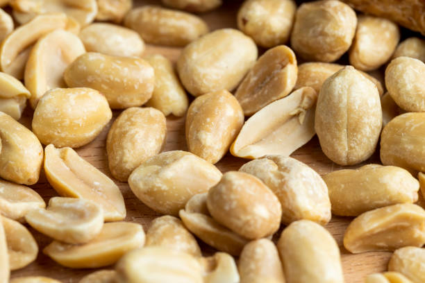 istock Peeled and roasted peanuts on the table 1445846989