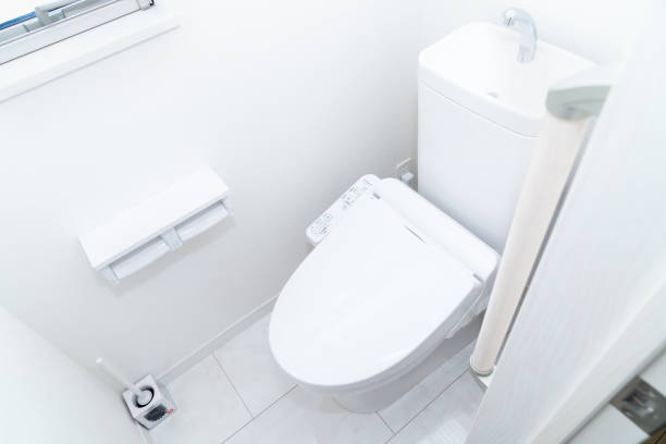 Photo of a toilet in a new house Photo of a toilet in a new house japanese toilet stock pictures, royalty-free photos & images