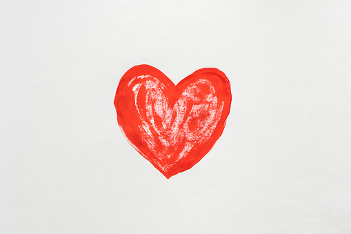 Small red shaded line heart art on white background. Donation and charity, open hearts of volunteer day. Cute love letter, message for beloved on saint valentines day. Healthcare. Copy space, top view