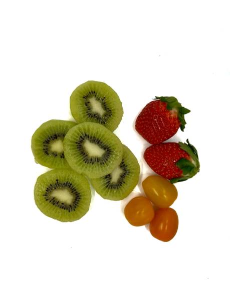 istock Kiwi, strawberry and tomato on a white background 1445859029