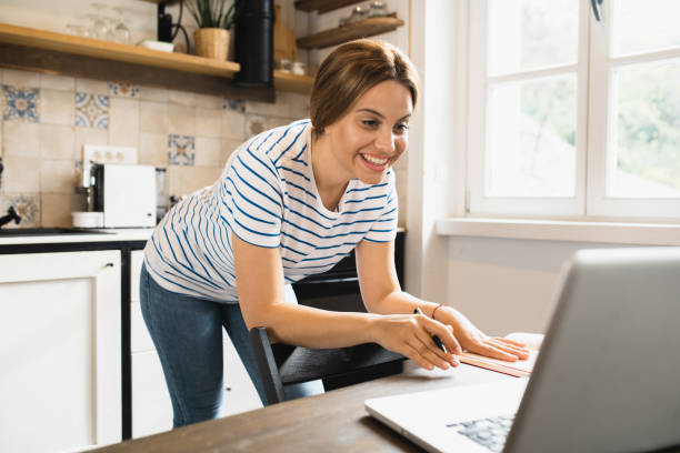 istock Young woman working from home 1445859062