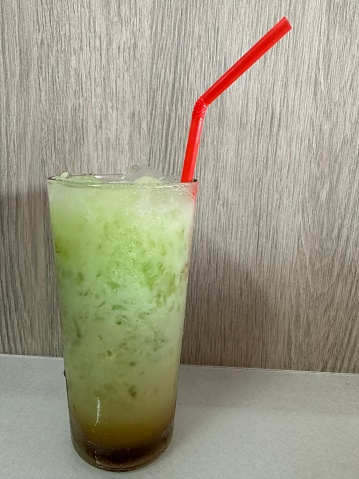A glass of ice lumut, also known as moss ice, ready to be served