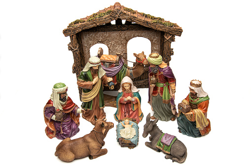 handmade clay hand with holy family figurines from Peru