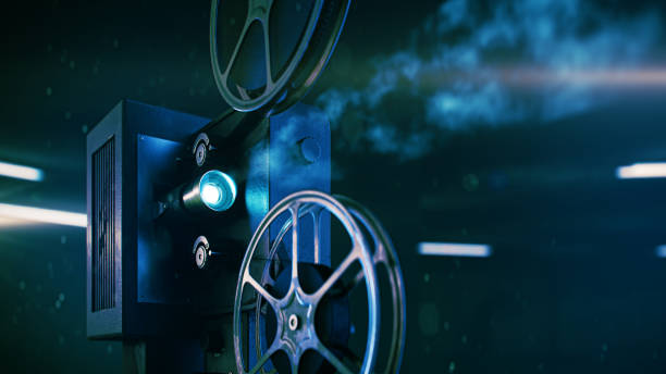 istock An old movie projector shining light in a dark place, 3d rendering 1445871178