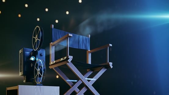 movie projector and movie director's chair in dark place, 3d rendering