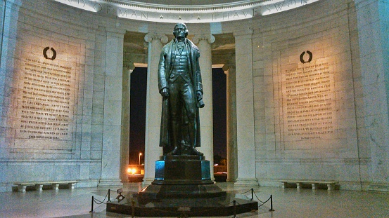 The national memorial of president Thomas Jefferson illuminated from within over the night in the nation's capital