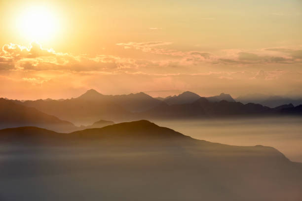istock Sea cloud below mountain peaks in the Swiss Alps 1445890955