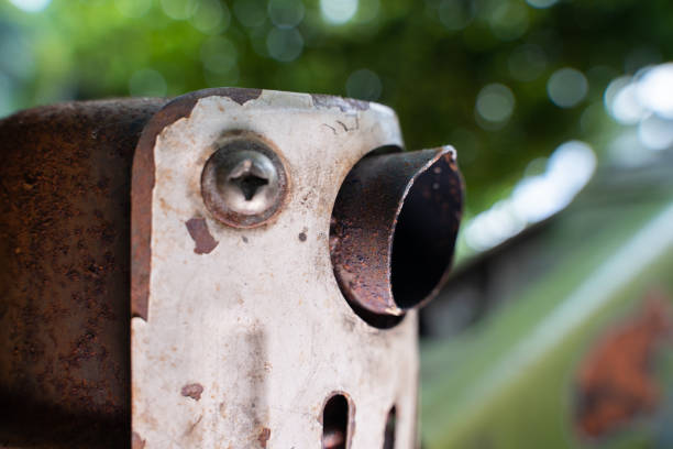 istock Exhaust pipe of a walk-behind tractor close-up on a blurred background 1445893880