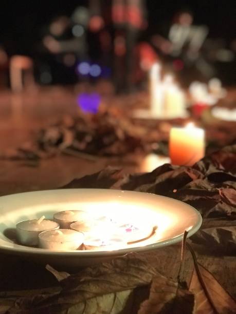 istock colorful candles burning in mystical,romantic setting 1445894566
