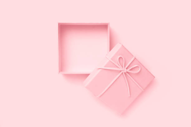istock Top view of empty open pink gift box for congratulations on pink background 1445901460