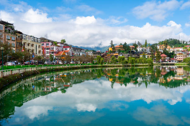 sapa lake and city with reflection and blue sky in lao cai province, vietnam - lao cai province bildbanksfoton och bilder