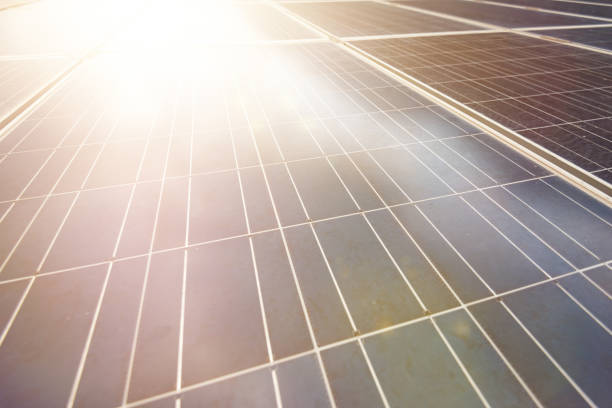 Detailed image of solar panels with reflected sunlight