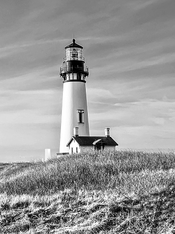 3.5 minute long exposure at of St Mary's Lighthouse in Whitley Bay, Tyne and Wear, UK. Converted to black and white and grain added.