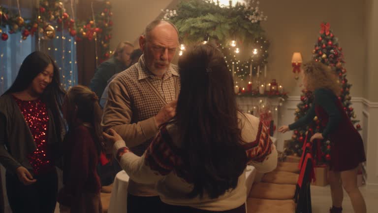 Diverse family arriving for Christmas party