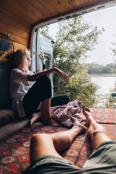 istock Couple enjoying the view from their van 1445914735